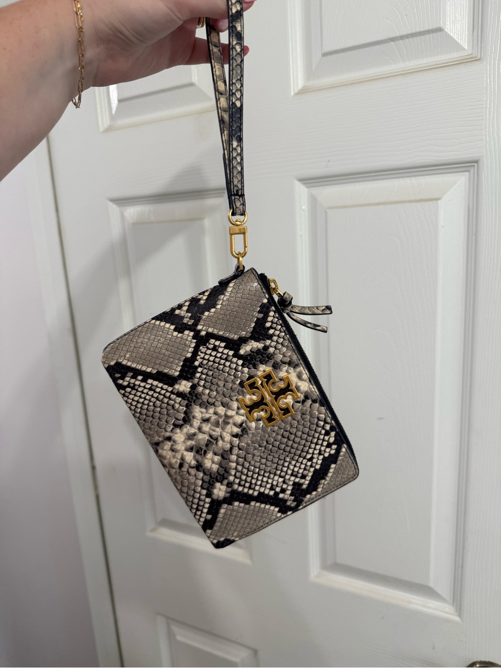 Tory Burch Snake-Print Wristlet in Black and Cream with Gold Logo